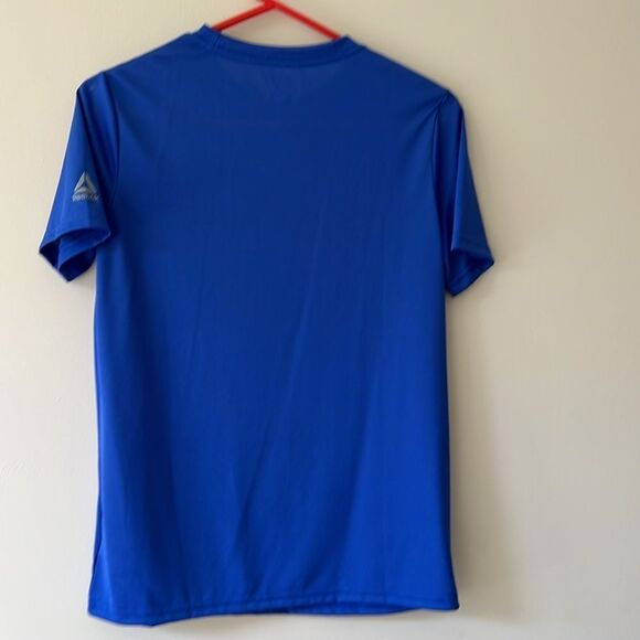 Reebok youth boys size 14-16 blue Savage on the Field shirt. - Picture 6 of 6